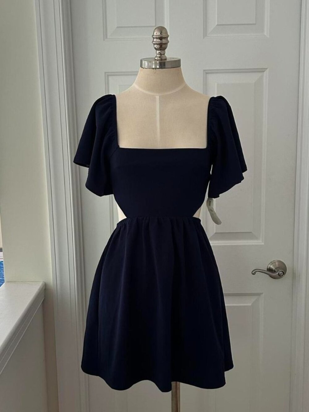 Altar'd State navy blue dress with back tie, square neckline, and side cutouts